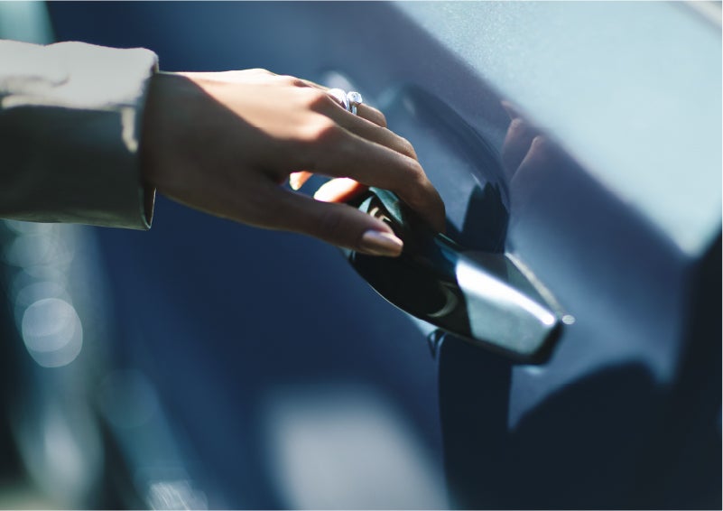 A hand gracefully grips the Light Touch Handle of a 2023 Lincoln Aviator® SUV to demonstrate its ease of use | Angela Krause Lincoln of Alpharetta in Alpharetta GA