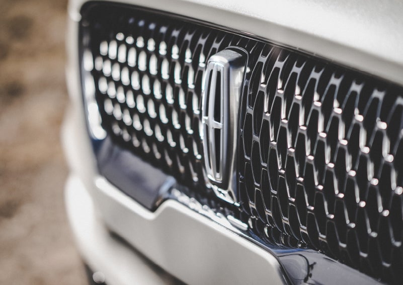The grille of the 2024 Lincoln Aviator® Reserve model with an eye-catching repeated field of Lincoln Star logo shapes | Angela Krause Lincoln of Alpharetta in Alpharetta GA