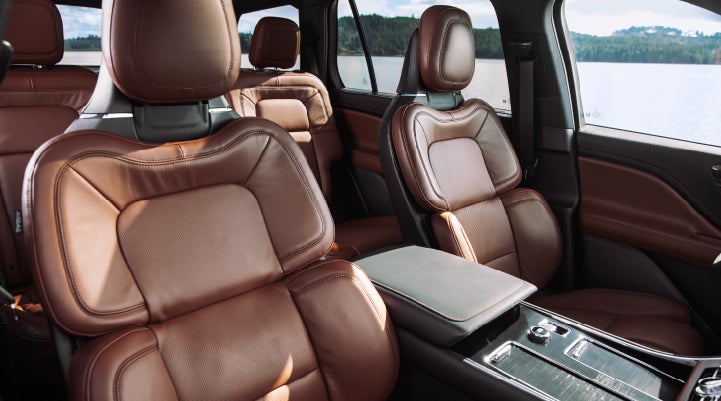 The front row's Perfect Position Seats in a 2024 Lincoln Aviator® Reserve model with Ebony Roast interior | Angela Krause Lincoln of Alpharetta in Alpharetta GA
