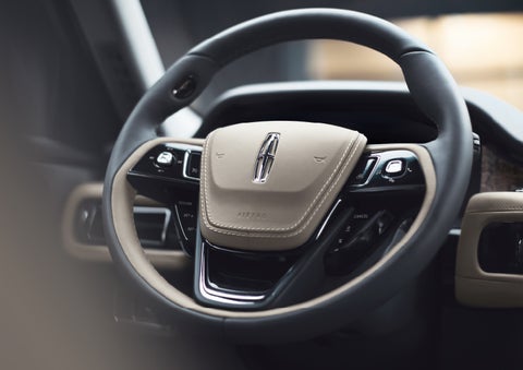 The intuitively placed controls of the steering wheel on a 2024 Lincoln Aviator® SUV | Angela Krause Lincoln of Alpharetta in Alpharetta GA