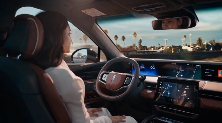 A person is shown driving hands-free on the highway with available Lincoln BlueCruise technology. | Angela Krause Lincoln of Alpharetta in Alpharetta GA