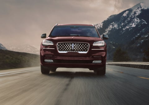 A 2024 Lincoln Aviator® SUV is shown in the Diamond Red exterior color. | Angela Krause Lincoln of Alpharetta in Alpharetta GA