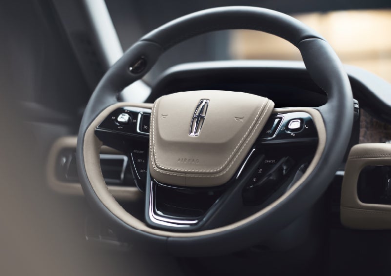 The intuitively placed controls of the steering wheel on a 2024 Lincoln Aviator® SUV | Angela Krause Lincoln of Alpharetta in Alpharetta GA