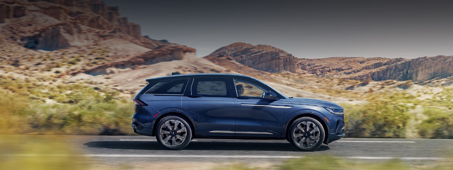 A 2024 Lincoln Nautilus® SUV is being driven in a desert setting. | Angela Krause Lincoln of Alpharetta in Alpharetta GA