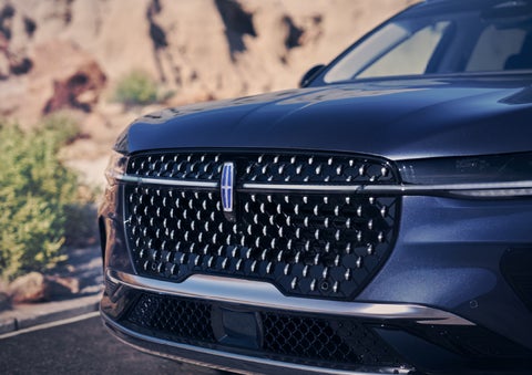 The stylish grille of a 2024 Lincoln Nautilus® SUV sparkles in the sunlight. | Angela Krause Lincoln of Alpharetta in Alpharetta GA