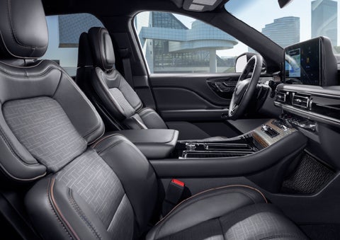 The interior of the 2025 Lincoln Aviator® SUV is shown with sleek black accents. | Angela Krause Lincoln of Alpharetta in Alpharetta GA