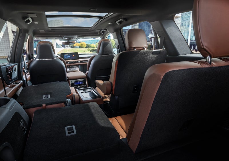 The interior of the 2025 Lincoln Aviator® SUV is shown with two seats folded down for added space. | Angela Krause Lincoln of Alpharetta in Alpharetta GA