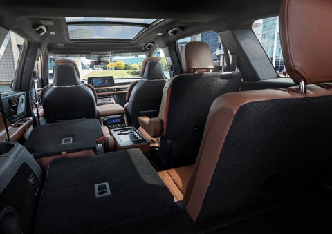 The interior of the 2025 Lincoln Aviator® SUV is shown with two seats folded down for added space. | Angela Krause Lincoln of Alpharetta in Alpharetta GA