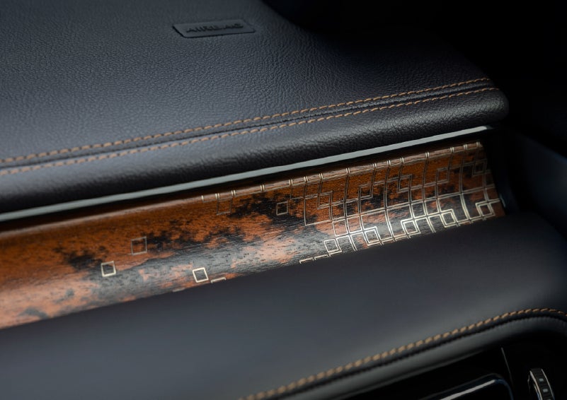 A close-up shot of the 2026 Lincoln Aviator® dashboard with unique black and brown accents and brown stitching. | Angela Krause Lincoln of Alpharetta in Alpharetta GA